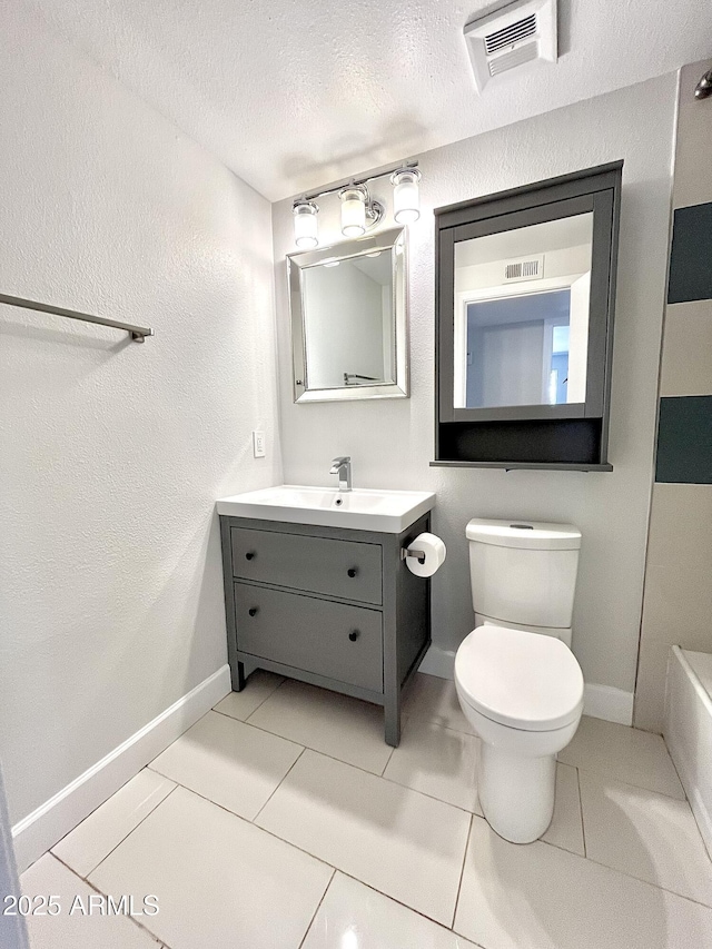 full bath with a textured ceiling, toilet, tile patterned flooring, and visible vents