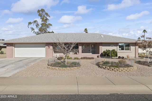 ranch-style house featuring a garage