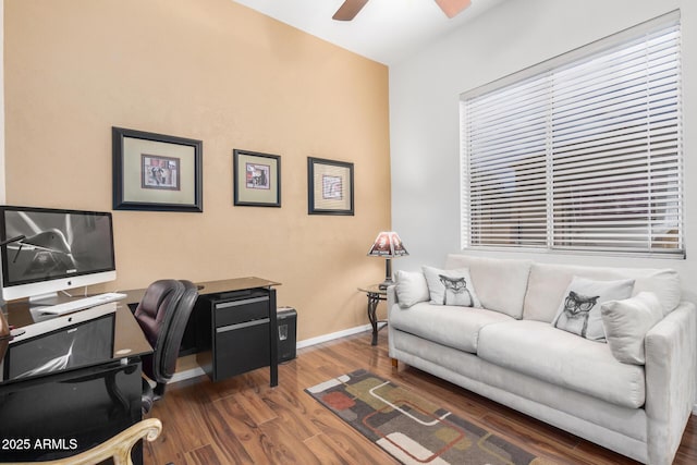 office with baseboards, a ceiling fan, and wood finished floors