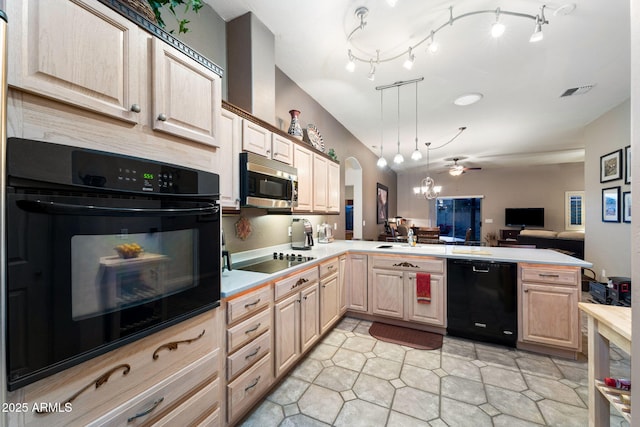 kitchen featuring decorative light fixtures, light brown cabinets, kitchen peninsula, a notable chandelier, and black appliances