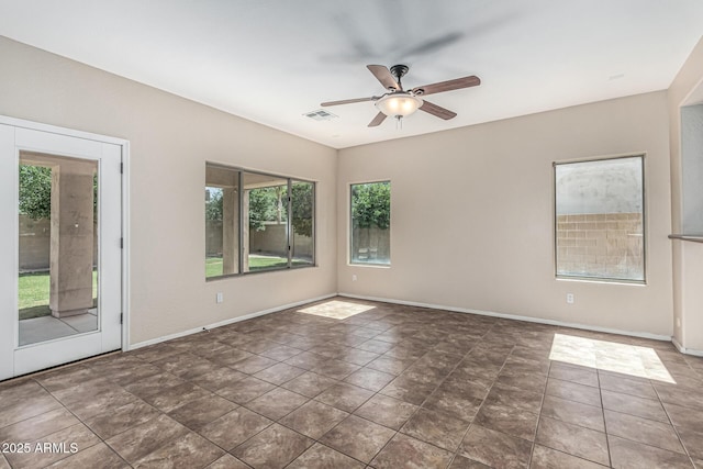 4507 E Lantern Pl, Gilbert, AZ 85297 - tiled empty room with ceiling fan and baseboards