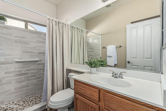 4507 E Lantern Pl, Gilbert, AZ 85297 - bathroom with vanity, a tile shower, and toilet
