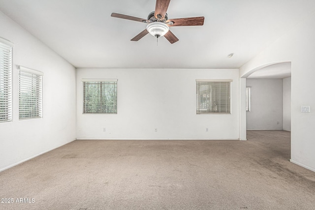 4507 E Lantern Pl, Gilbert, AZ 85297 - carpeted empty room featuring arched walkways and ceiling fan