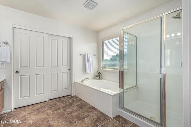 4507 E Lantern Pl, Gilbert, AZ 85297 - bathroom with a stall shower, a garden tub, and vanity