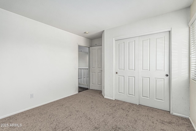 4507 E Lantern Pl, Gilbert, AZ 85297 - unfurnished bedroom featuring carpet floors, a closet, and baseboards
