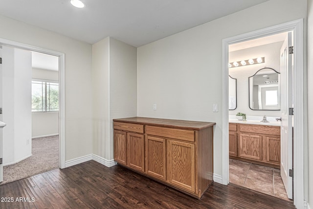 4507 E Lantern Pl, Gilbert, AZ 85297 - bathroom with vanity, wood finished floors, and baseboards