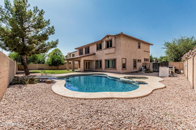 4507 E Lantern Pl, Gilbert, AZ 85297 - view of swimming pool featuring a fenced backyard, a pool with connected hot tub, and a patio
