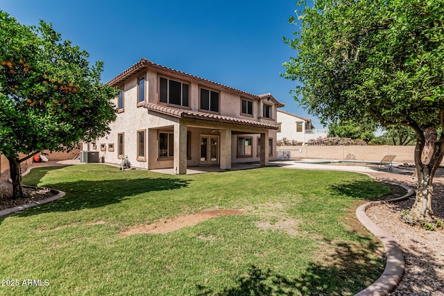 4507 E Lantern Pl, Gilbert, AZ 85297 - rear view of house featuring a tile roof, stucco siding, a patio area, and central AC