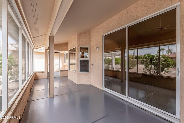 unfurnished sunroom with a healthy amount of sunlight