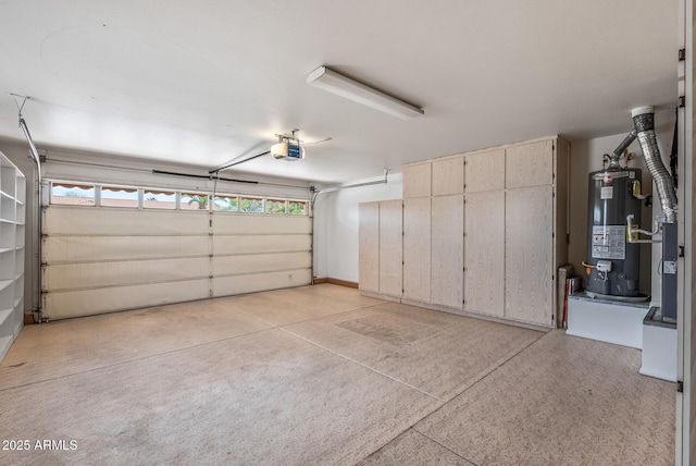 garage featuring water heater and a garage door opener