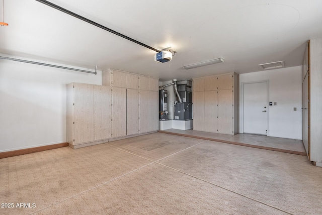 garage with water heater, heating unit, a garage door opener, and baseboards