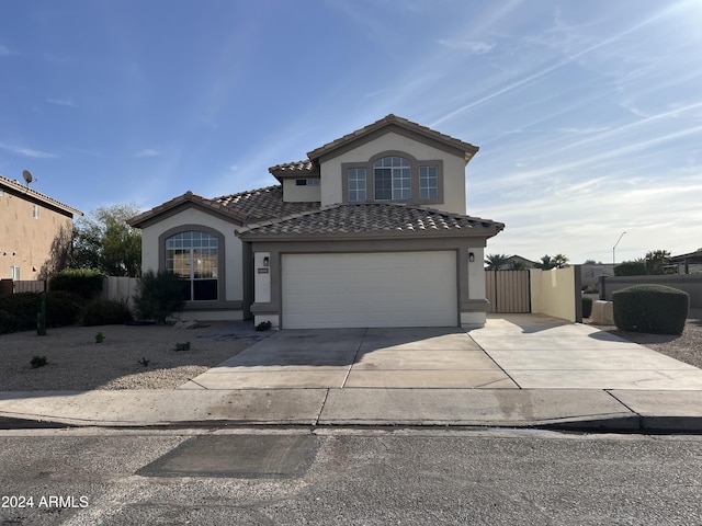 view of front of property with a garage