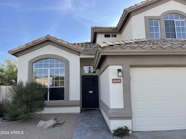 entrance to property with a garage