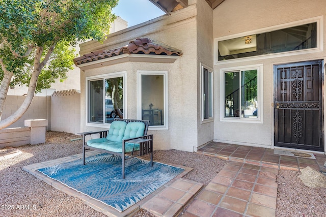 view of patio featuring fence