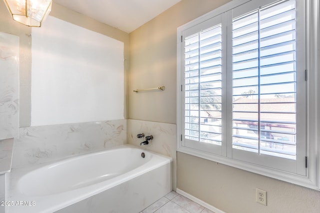 full bathroom featuring a bath and tile patterned floors