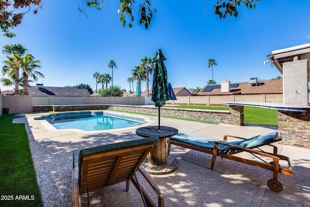 view of pool featuring a patio area, a fenced backyard, and a fenced in pool