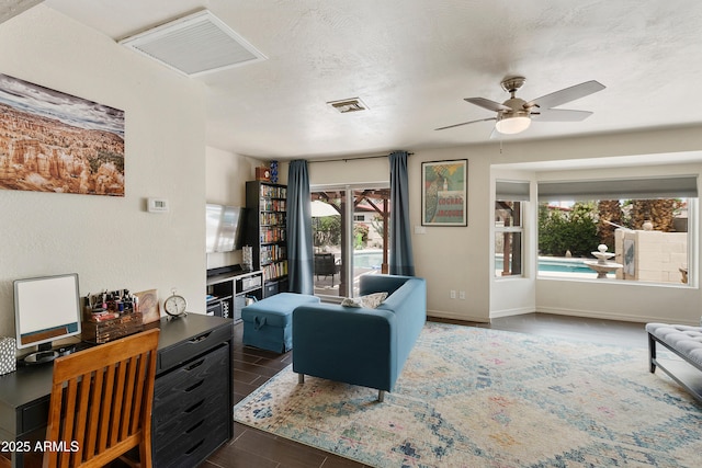 1656 W Meseto Cir, Mesa, AZ 85202 - living room with ceiling fan, baseboards, and wood finished floors