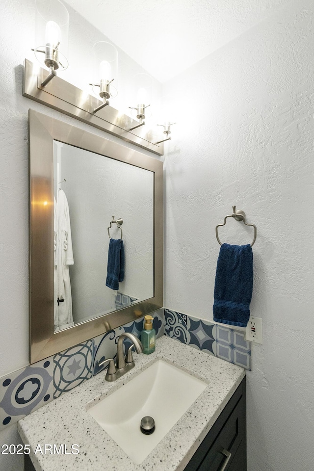 1656 W Meseto Cir, Mesa, AZ 85202 - bathroom featuring vanity and a chandelier