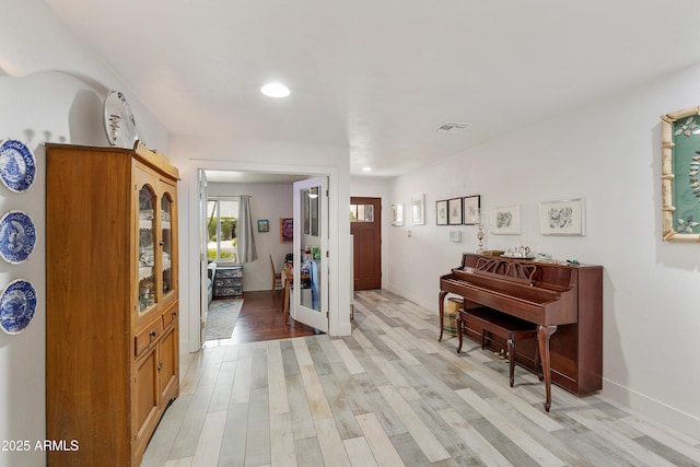 1656 W Meseto Cir, Mesa, AZ 85202 - entryway featuring baseboards, light wood-style flooring, and recessed lighting