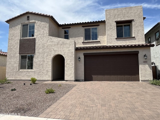 view of front of house with a garage