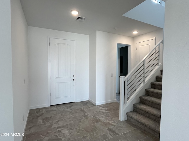 view of tiled foyer entrance