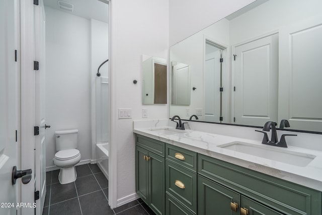 full bathroom with bathing tub / shower combination, tile patterned floors, vanity, and toilet