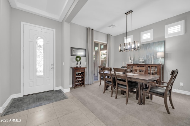 dining area with light carpet