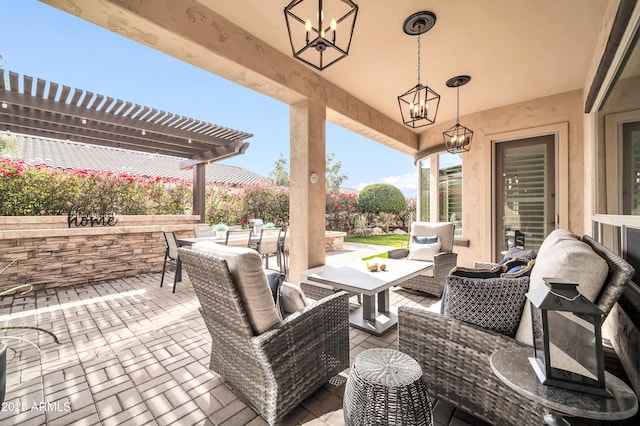 view of patio with outdoor lounge area and a pergola