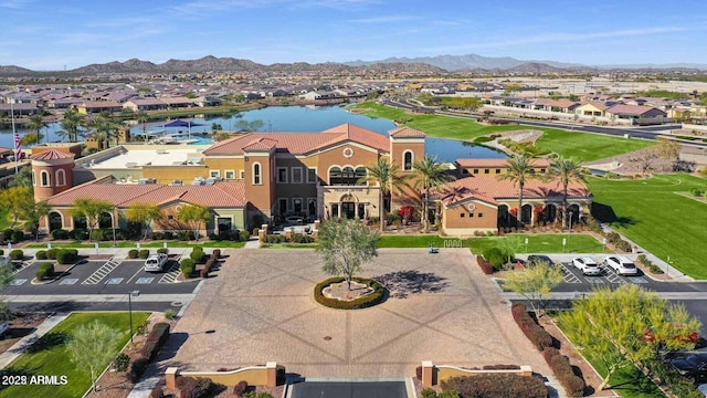 bird's eye view with a water and mountain view