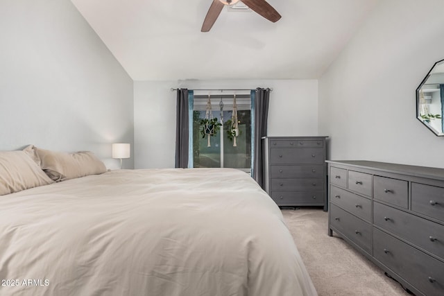 bedroom with light colored carpet, vaulted ceiling, access to outside, and a ceiling fan