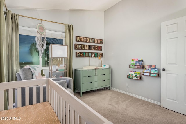 bedroom featuring carpet floors and baseboards