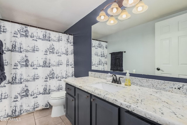 full bathroom featuring tile patterned flooring, a chandelier, toilet, vanity, and curtained shower