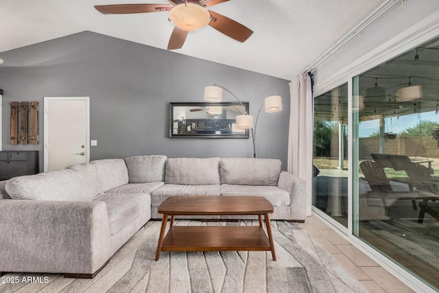 living room with vaulted ceiling and ceiling fan