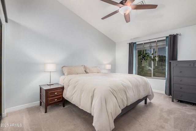 bedroom featuring lofted ceiling, carpet floors, baseboards, and a ceiling fan