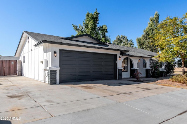 ranch-style home with a garage