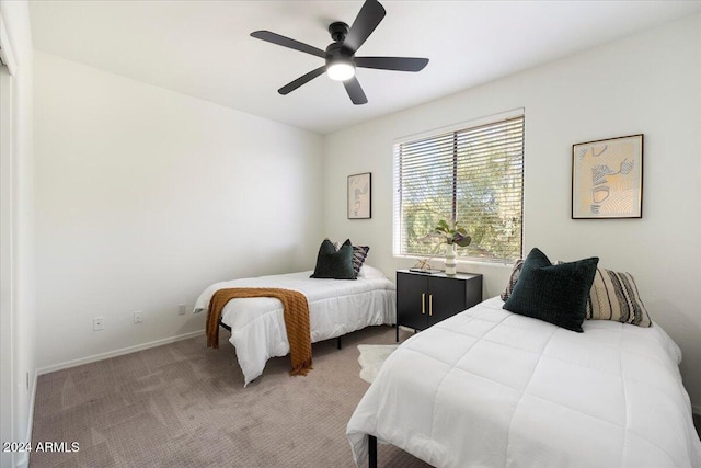 bedroom featuring carpet flooring and ceiling fan