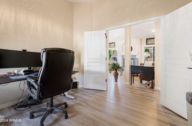 office space featuring light wood-type flooring