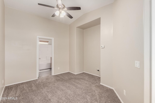 22125 N 29th Ave Unit 158, Phoenix, AZ 85027 - empty room featuring carpet flooring, ceiling fan, baseboards, and lofted ceiling
