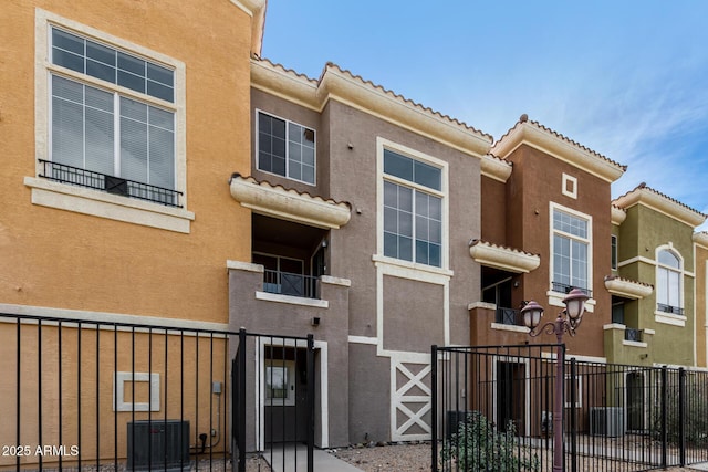 22125 N 29th Ave Unit 158, Phoenix, AZ 85027 - view of property featuring a fenced front yard and cooling unit