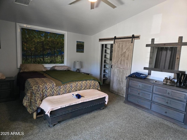 9016 W Fossil Creek Rd, Pine, AZ 85544 - carpeted bedroom with a barn door, vaulted ceiling, and ceiling fan