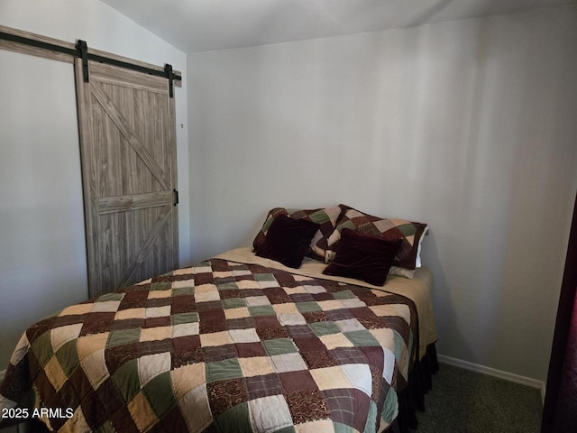 9016 W Fossil Creek Rd, Pine, AZ 85544 - bedroom with a barn door and carpet floors