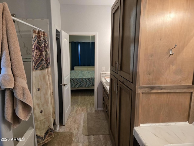 9016 W Fossil Creek Rd, Pine, AZ 85544 - bathroom featuring vanity, wood finished floors, ensuite bath, and a shower with curtain