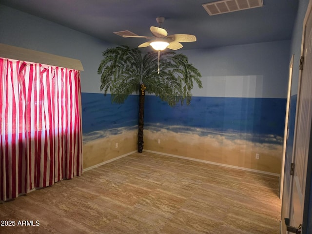 9016 W Fossil Creek Rd, Pine, AZ 85544 - empty room with wood finished floors, ceiling fan, and baseboards