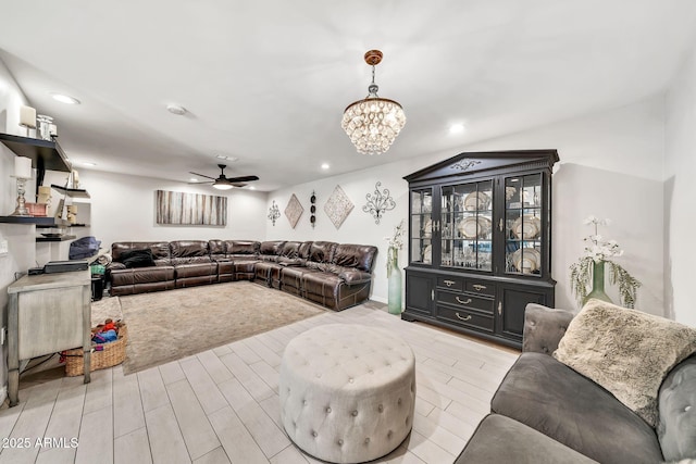 6215 E Surrey Ave, Scottsdale, AZ 85254 - living room with a ceiling fan, light wood-style floors, a chandelier, and recessed lighting