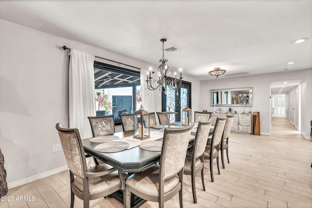 6215 E Surrey Ave, Scottsdale, AZ 85254 - dining area with light wood-type flooring, a chandelier, and recessed lighting
