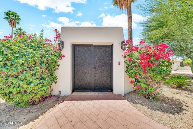 6215 E Surrey Ave, Scottsdale, AZ 85254 - view of exterior entry with stucco siding