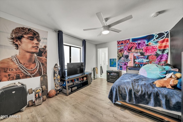 6215 E Surrey Ave, Scottsdale, AZ 85254 - bedroom with wood finished floors and a ceiling fan