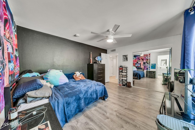 6215 E Surrey Ave, Scottsdale, AZ 85254 - bedroom with wood finished floors and ceiling fan