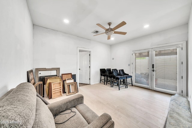 6215 E Surrey Ave, Scottsdale, AZ 85254 - living room featuring a ceiling fan, recessed lighting, and wood finished floors