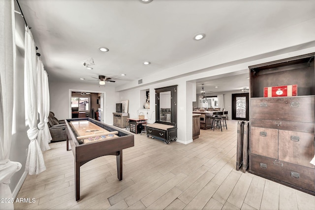 6215 E Surrey Ave, Scottsdale, AZ 85254 - rec room with healthy amount of natural light, light wood finished floors, ceiling fan, and recessed lighting